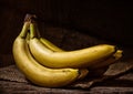 Yellow Bananas on a Wood Table Royalty Free Stock Photo