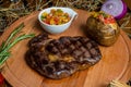 Fresh roast beef meat ribeye steak on wooden plate Royalty Free Stock Photo
