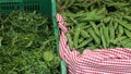 fresh rocket arugula and peas in the pods Royalty Free Stock Photo