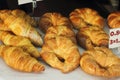 Fresh rolls, bagels, croissants on shop-window, street food