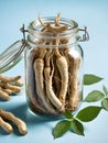 fresh root and ginseng root in glass jar on wooden table Royalty Free Stock Photo