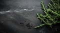 fresh rosemary herbs arranged on a dark stone background, providing ample copy space for a menu or recipe, captured in a Royalty Free Stock Photo