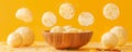 Fresh Round Cheese Balls Flying Above Wooden Bowl Against Yellow Background Dairy Delight Concept