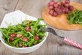 Fresh rucola salad with red grapes Royalty Free Stock Photo