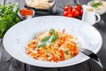 Fresh salad with apple, carrot, cabbage, celery and lemon on wooden background close up. Royalty Free Stock Photo