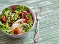 Fresh salad with avocado, tomato and mozzarella, in a white bowl Royalty Free Stock Photo