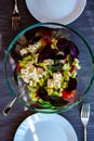 Fresh salad bowl with goat cheese and tomatoes cucumber Royalty Free Stock Photo