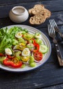 Fresh salad with cherry tomatoes, cucumbers, sweet peppers, celery and quail eggs. Royalty Free Stock Photo