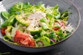 Fresh salad with chicken breast, corn salad, cucumber, avocado and tomato. Chicken salad. Royalty Free Stock Photo