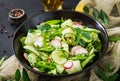 Fresh salad of cucumbers, radishes, green peas Royalty Free Stock Photo