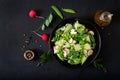 Fresh salad of cucumbers, radishes, green peas Royalty Free Stock Photo