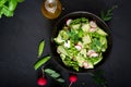 Fresh salad of cucumbers, radishes, green peas and herbs Royalty Free Stock Photo