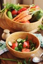 fresh salad with cucumbers and tomatoes picked from farm garden Royalty Free Stock Photo