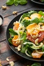 Fresh salad with fennel, orange, grapefruit, spinach and cashew nuts. healthy food. Royalty Free Stock Photo