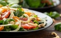 Fresh salad with fennel, orange, grapefruit, spinach and cashew nuts. healthy food. Royalty Free Stock Photo