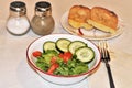 Fresh Salad with Garlic Toast on White Table Royalty Free Stock Photo