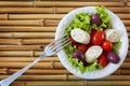 Fresh salad of heart of palm (palmito), cherry tomatos, olives Royalty Free Stock Photo