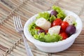 Fresh salad of heart of palm (palmito), cherry tomatos, olives Royalty Free Stock Photo