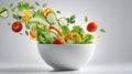 Fresh salad ingredients explode into a vibrant white bowl Royalty Free Stock Photo