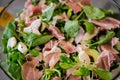 Fresh salad with lamb lettuce, avocado and prosciutto