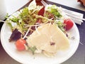 Fresh salad from lettuce leaves of different kinds of varieties cabbage carrots rucola salad. Royalty Free Stock Photo