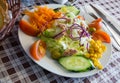 Tasty fresh salad with mix vegetables, boiled carrot and corn Royalty Free Stock Photo