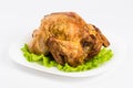 Fresh salad on a plate on whiteroasted chicken with vegetables on plate isolated on white