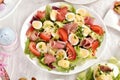 Fresh salad with quail eggs and prosciutto ham for Easter breakfast Royalty Free Stock Photo