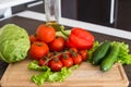 Fresh salad vegetables on the home table Royalty Free Stock Photo