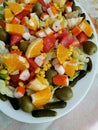 Fresh salade with citrus, vegetables and surimi