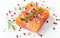 Fresh Salmon Fillet With Herbs and Spices on a White Marble Surface