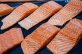 Fresh salmon. Salmon fillets for sale at a fish market displayed with a patchwork effect. Royalty Free Stock Photo