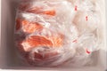 Fresh salmon fillets wrapped in plastic Royalty Free Stock Photo