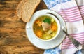 Fresh salmon fish soup with carrots and potatoes in a white bowl Royalty Free Stock Photo