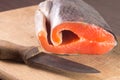 Fresh Salmon with knife on board Royalty Free Stock Photo