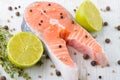 Fresh salmon with lime, pepper and thyme Royalty Free Stock Photo