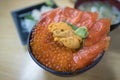 Fresh salmon and sea urchin rice bowl Royalty Free Stock Photo