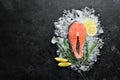 Fresh salmon steak on ice. Top view. Royalty Free Stock Photo