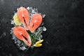 Fresh salmon steak on ice. Top view. Royalty Free Stock Photo