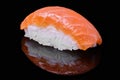 Fresh Salmon Sushi on black background. Nigiri or Sashimi Royalty Free Stock Photo