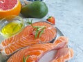 Fresh salmon, tomato tasty antioxidant seasoning appetizer on concrete background seafood dinner Royalty Free Stock Photo