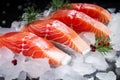 Fresh salmon or trout fish fillet on ice, ready for cooking. Storing fresh chilled fish. Close-up Royalty Free Stock Photo