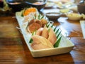 Fresh salmon, tuna and hamachi on dish. Japanese food sashimi set Royalty Free Stock Photo