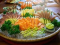 Fresh salmon, tuna and hamachi on ice in dish. Japanese food sashimi set Royalty Free Stock Photo