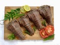 Fresh Sand Lobster or Flathead Lobster or Slipper Lobster (Thenus Orientalis) decorated with herbs and vegetables . Royalty Free Stock Photo