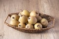 Fresh sapodilla in basket tropical fruit evergreen tree and sweet taste fruit Royalty Free Stock Photo