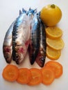 Sardines slices of lemon and carot