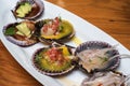 Fresh scallops new peruvian cuisine style Royalty Free Stock Photo