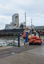 Fresh Sea food caught at sea being unloaded off fishing boat at Whitstable harbour