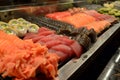 fresh seafood display with tuna, salmon, and eel for sushi Royalty Free Stock Photo